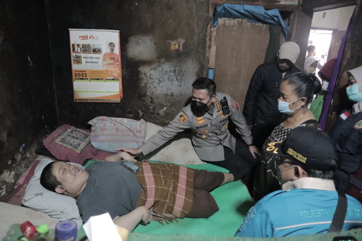 Jelang Hari Disabilitas Internasional Polresta Malang Kota, TNI dan PPNI Serta Relawan Gelar Baksos Kesehatan